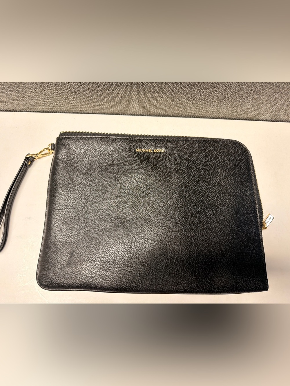 Michael Kors Black Pebbled Leather Toiletry Pouch with Gold Logo